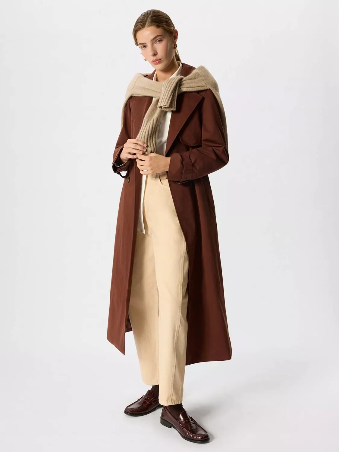 Chocolate Brown Trench Coat with Cream Trousers and Loafers
