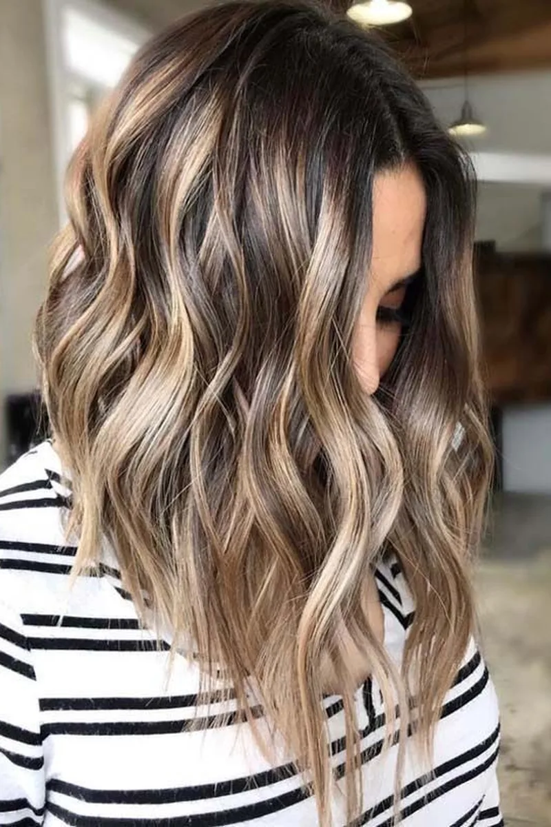 Soft Blonde Balayage on Medium-Length Waves