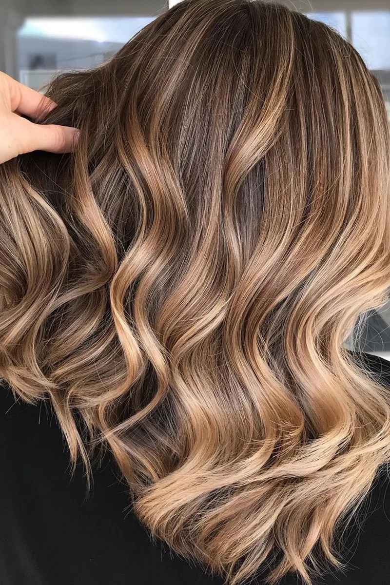 Brown to Blonde Balayage with Defined Waves