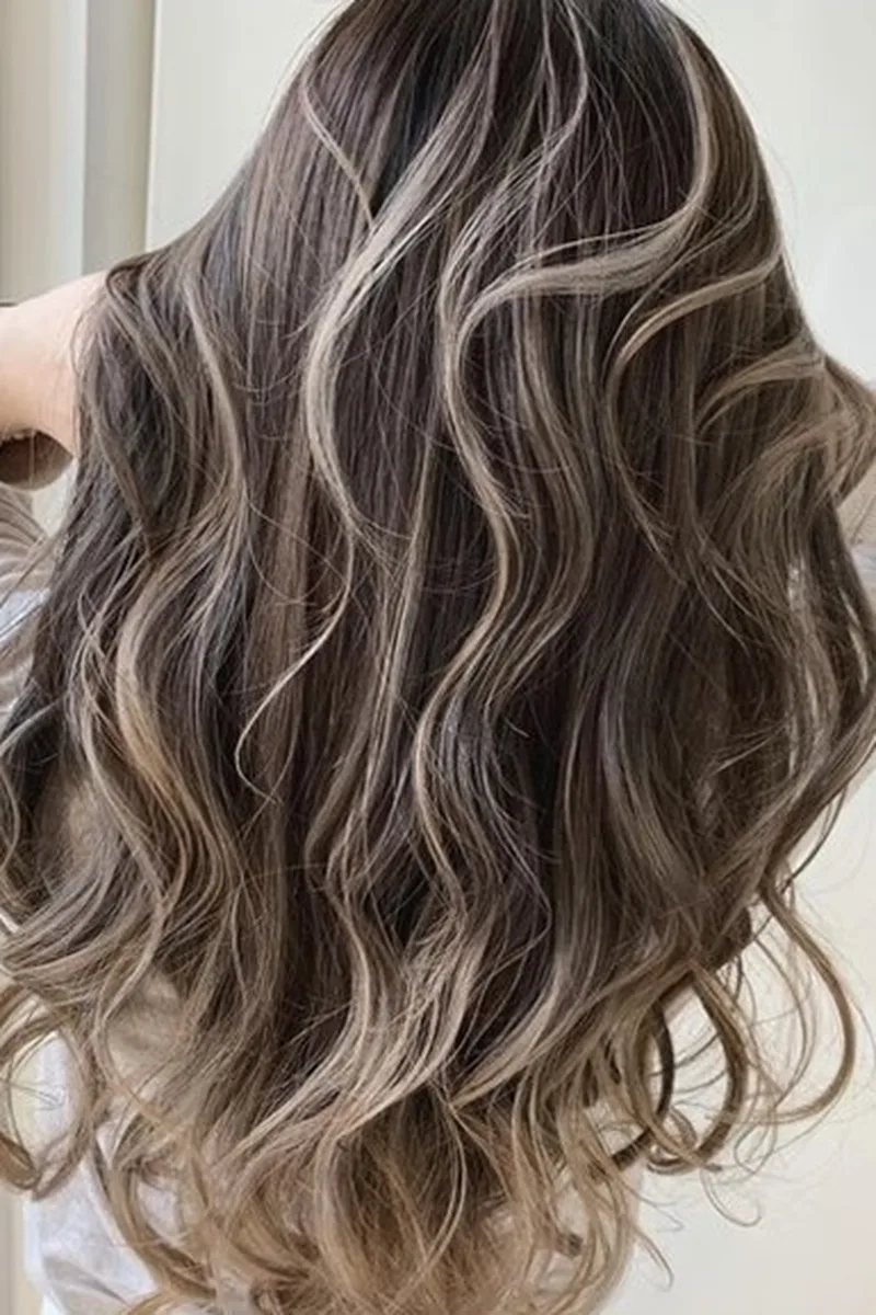 Ash Blonde and Beige Balayage on Long Waves