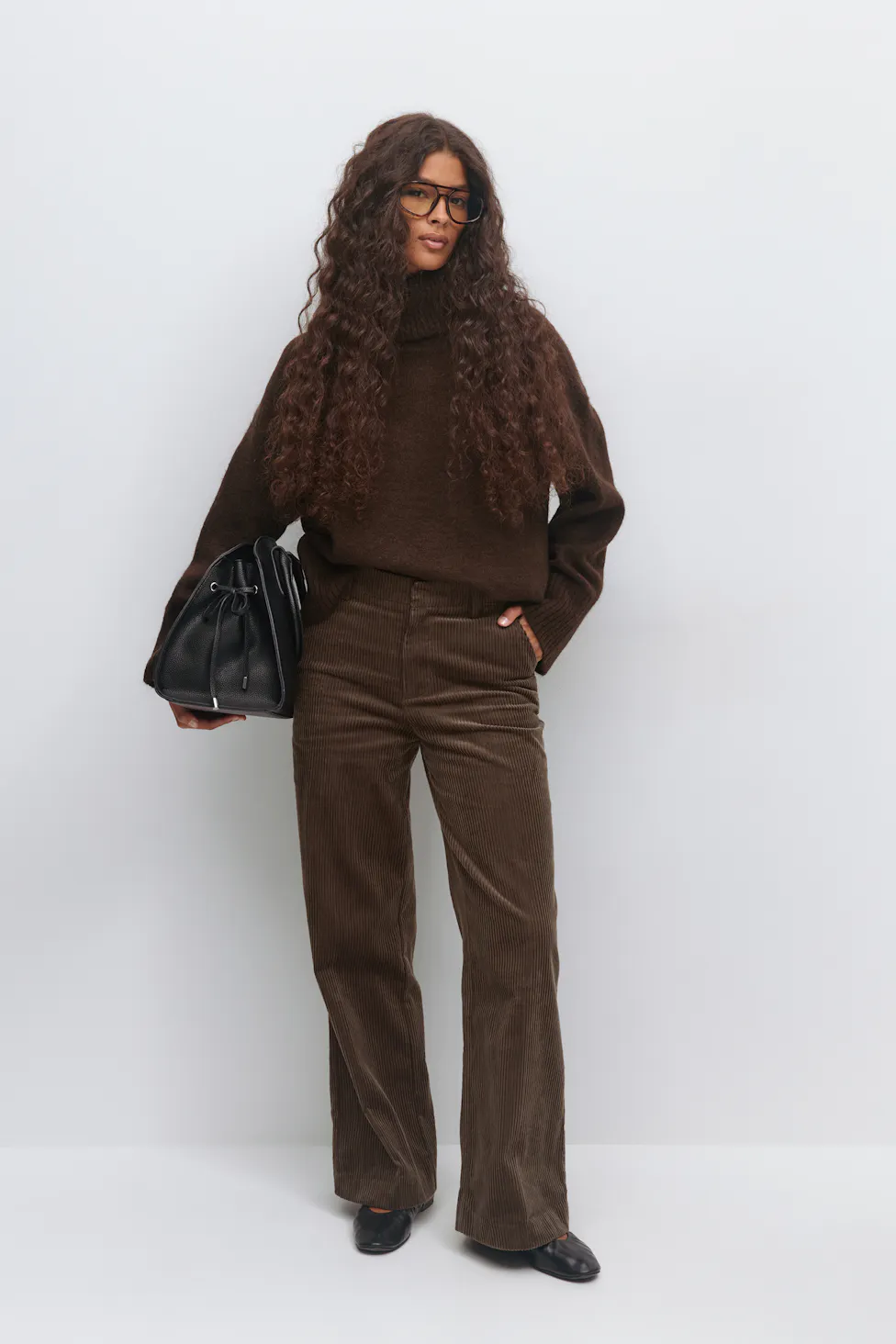 Chocolate Brown Corduroy Trousers with a Turtleneck and Loafers