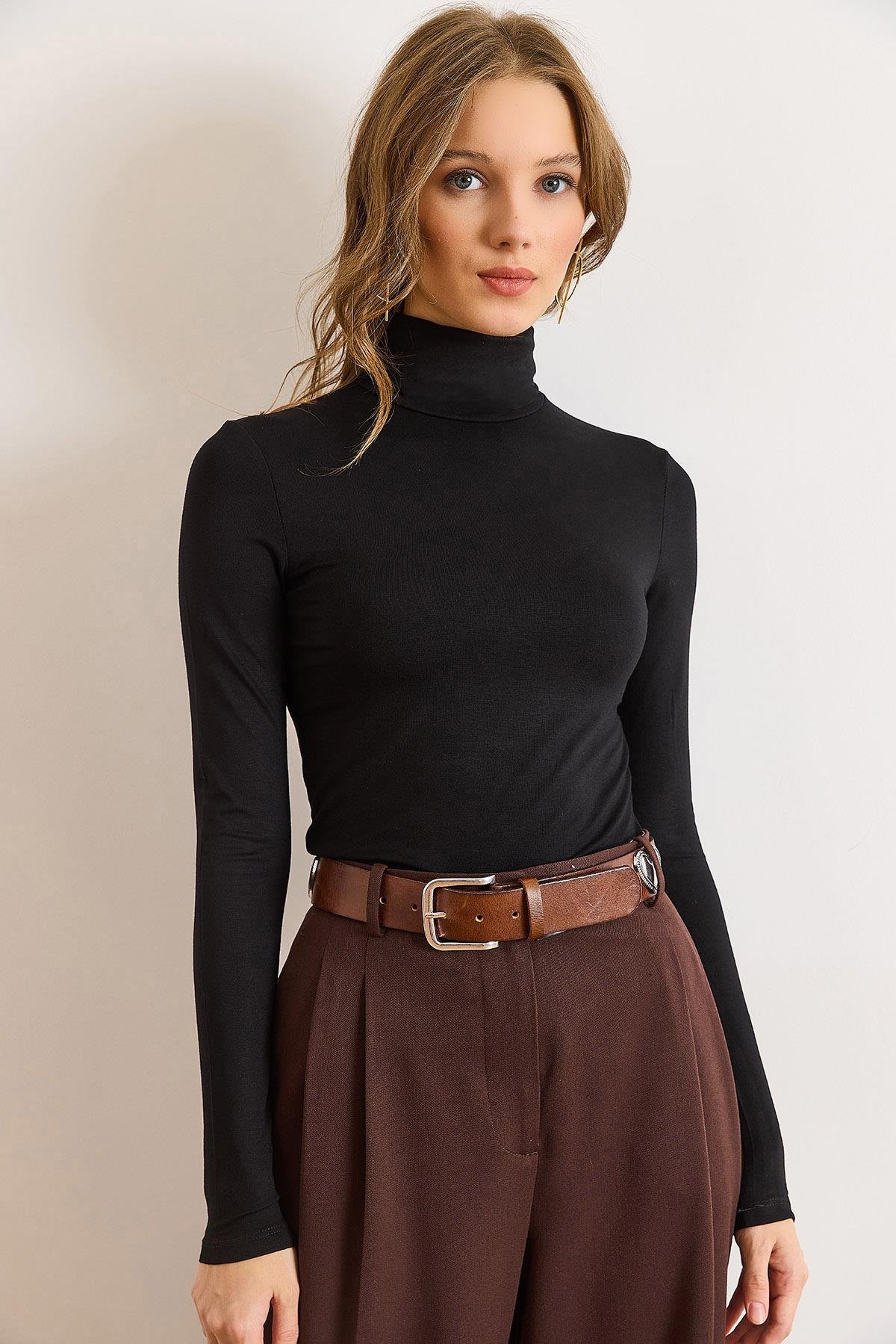 Chocolate Brown Pleated Trousers with a Black Turtleneck