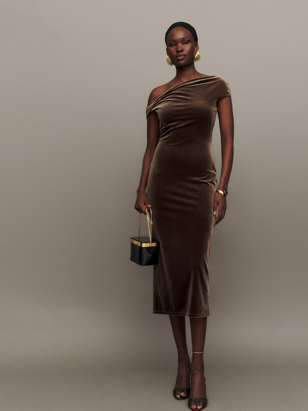 Chocolate Brown Velvet Dress with a Statement Clutch