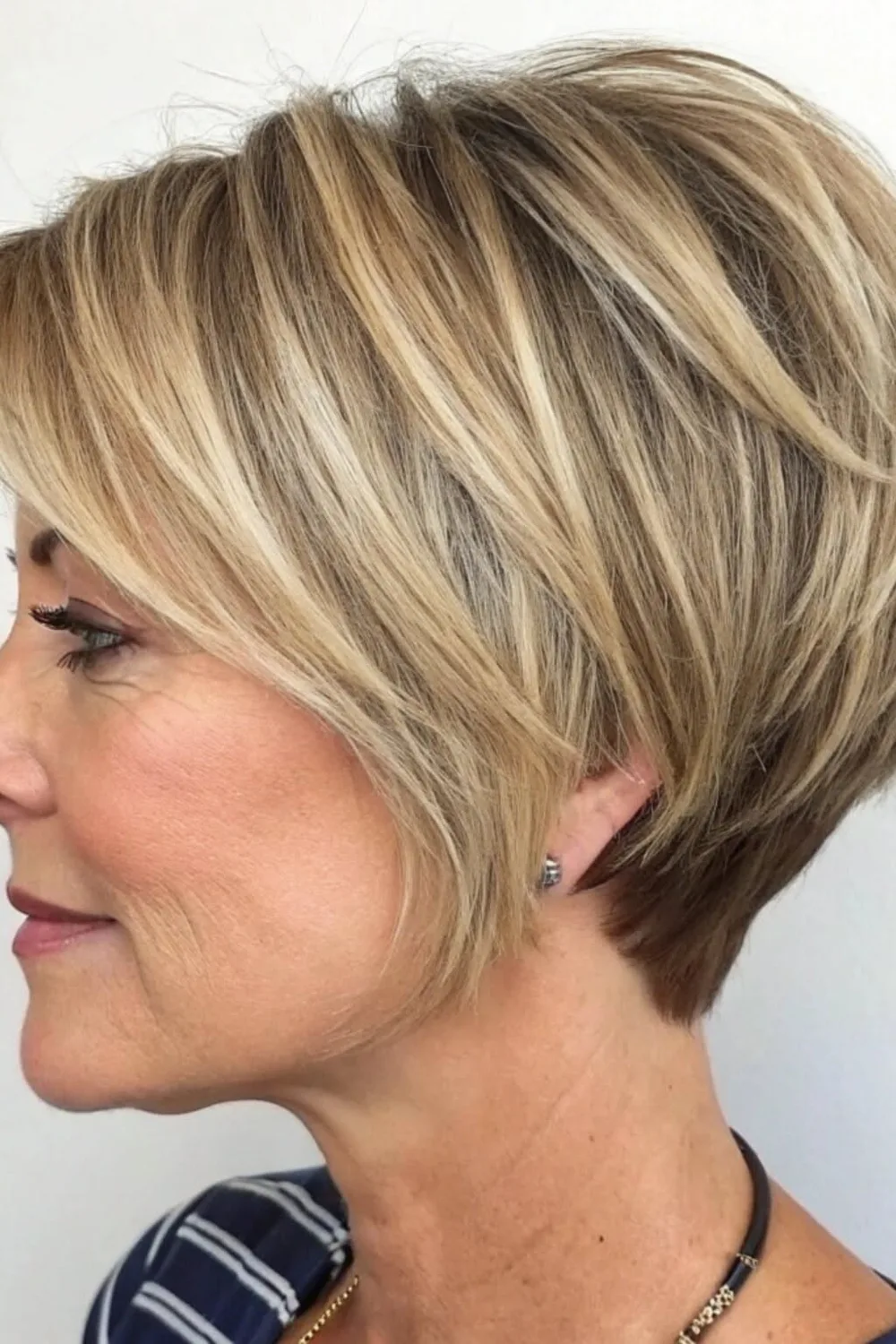 Short Blonde Layered Pixie Bob with Tapered Nape