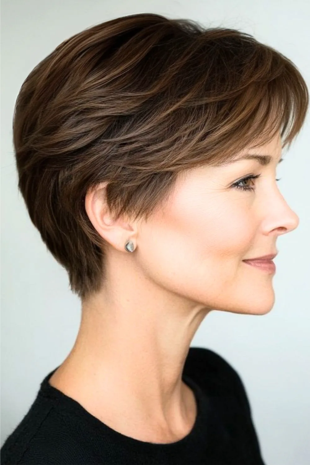 20 Bob Hairstyles for Women Over 60 That Look Polished and Feel Effortless 3 Brunette Pixie Bob