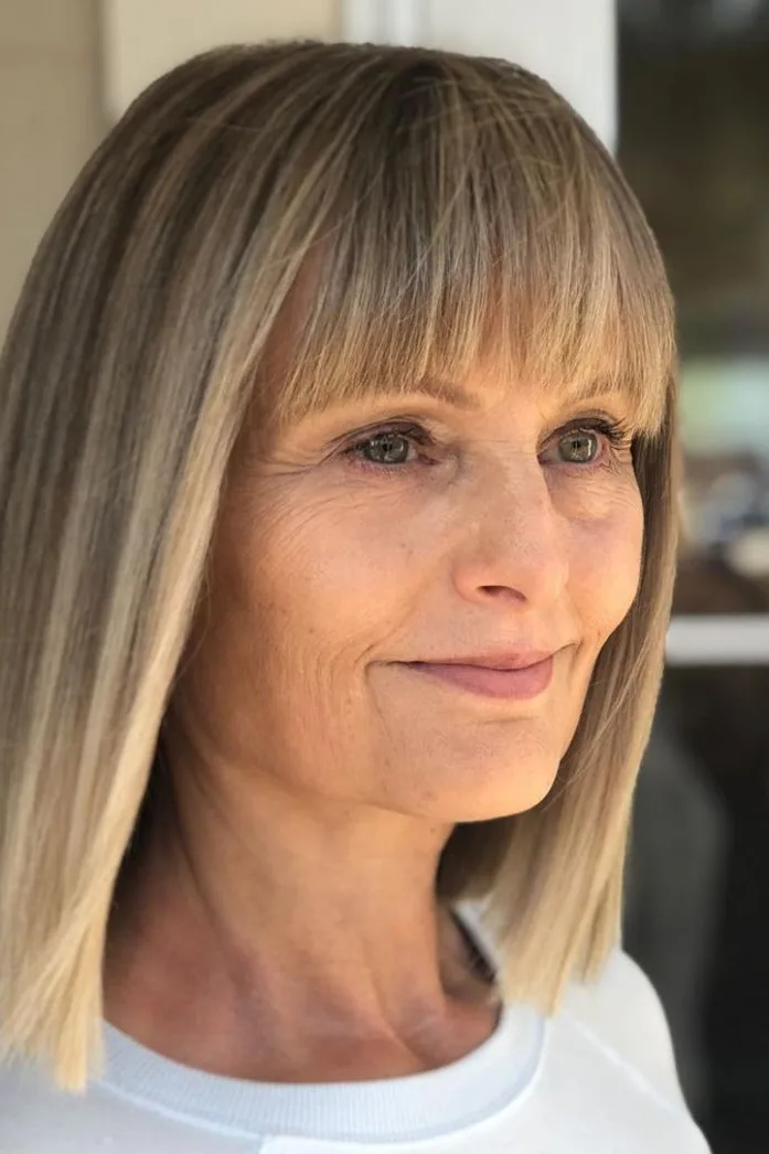 26 Stylish Hairstyles for Women Over 40 With Bangs That Look Fresh and Modern 15 Classic Long Bob With Bangs