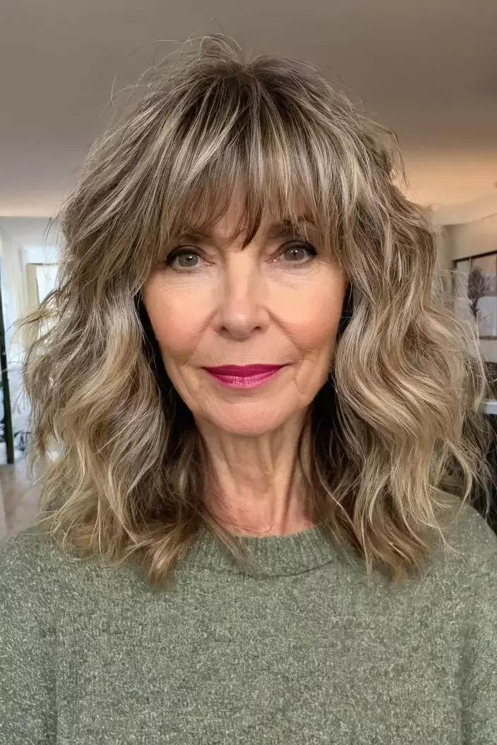 26 Stylish Hairstyles for Women Over 40 With Bangs That Look Fresh and Modern 7 Natural Waves With Curtain Bangs