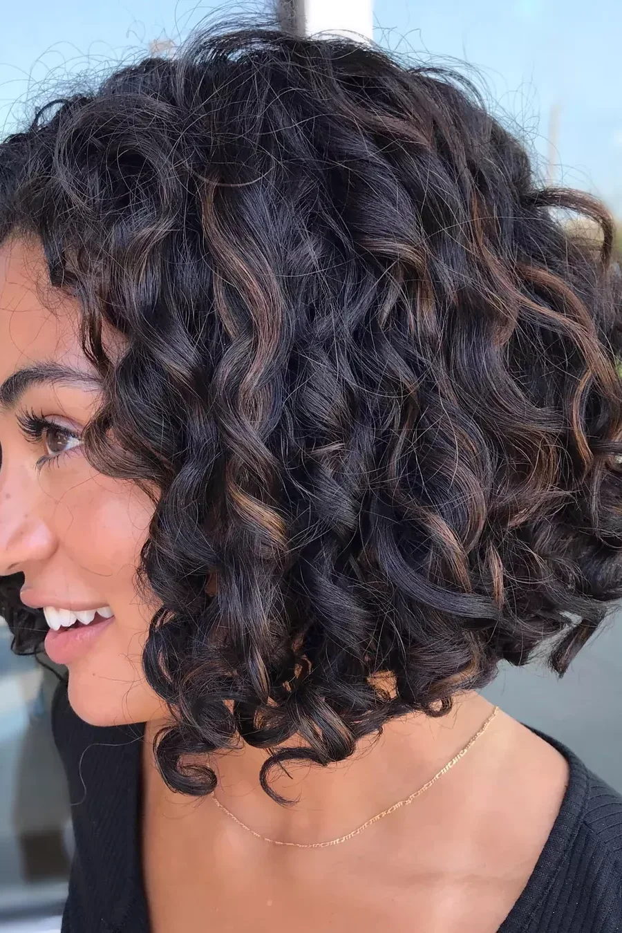 Curly Cut with Mahogany Tones