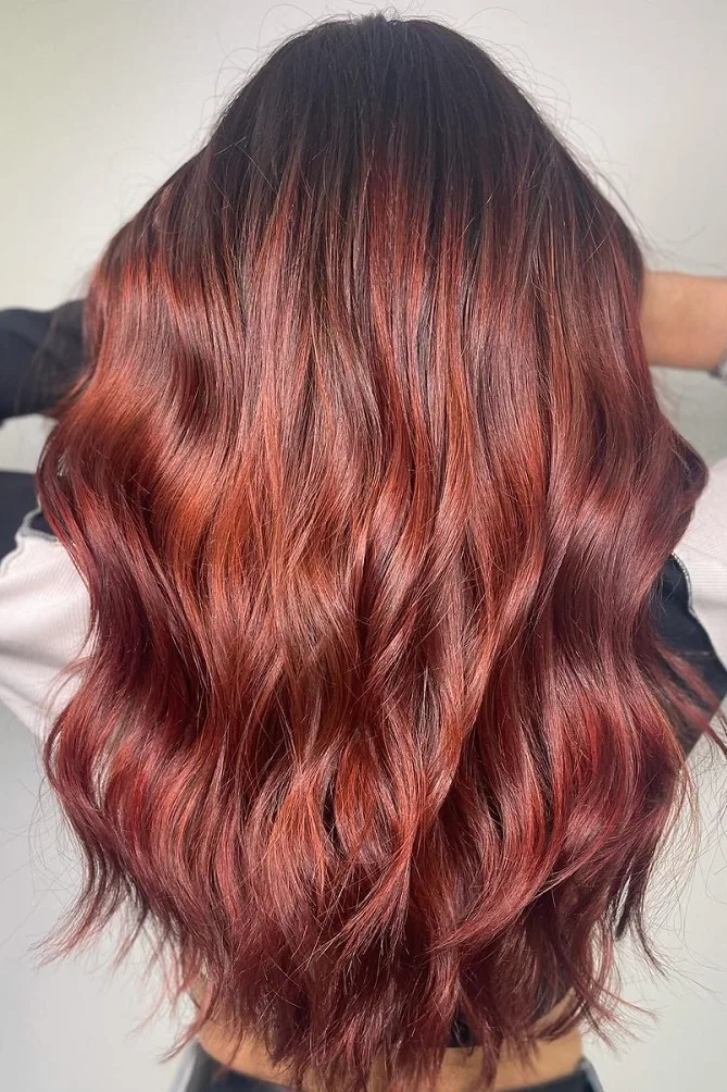 Sleek Red Copper Melt on Dark Hair
