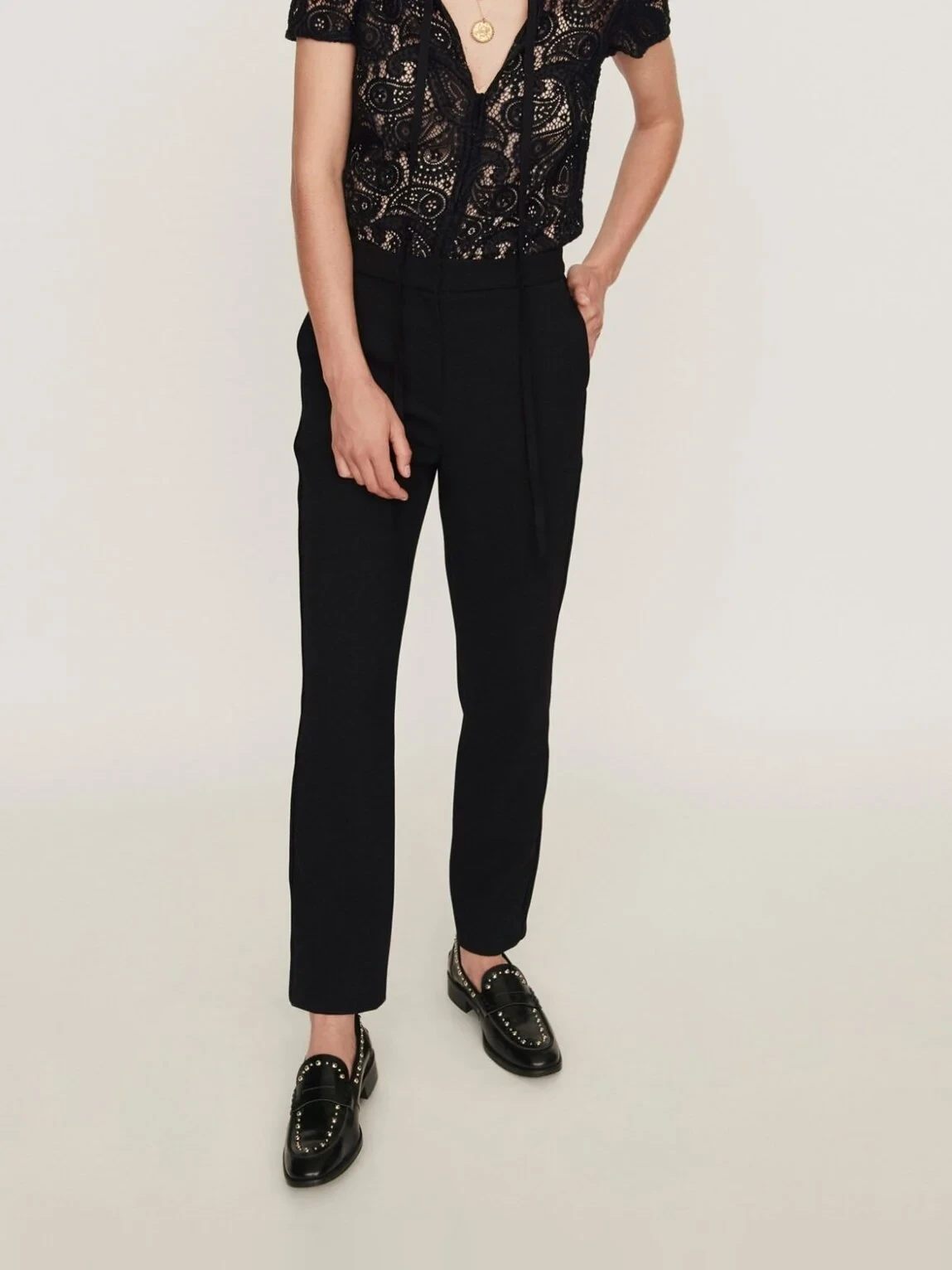 Soft black lace top and trouser outfit with smart loafers and a slim leather belt