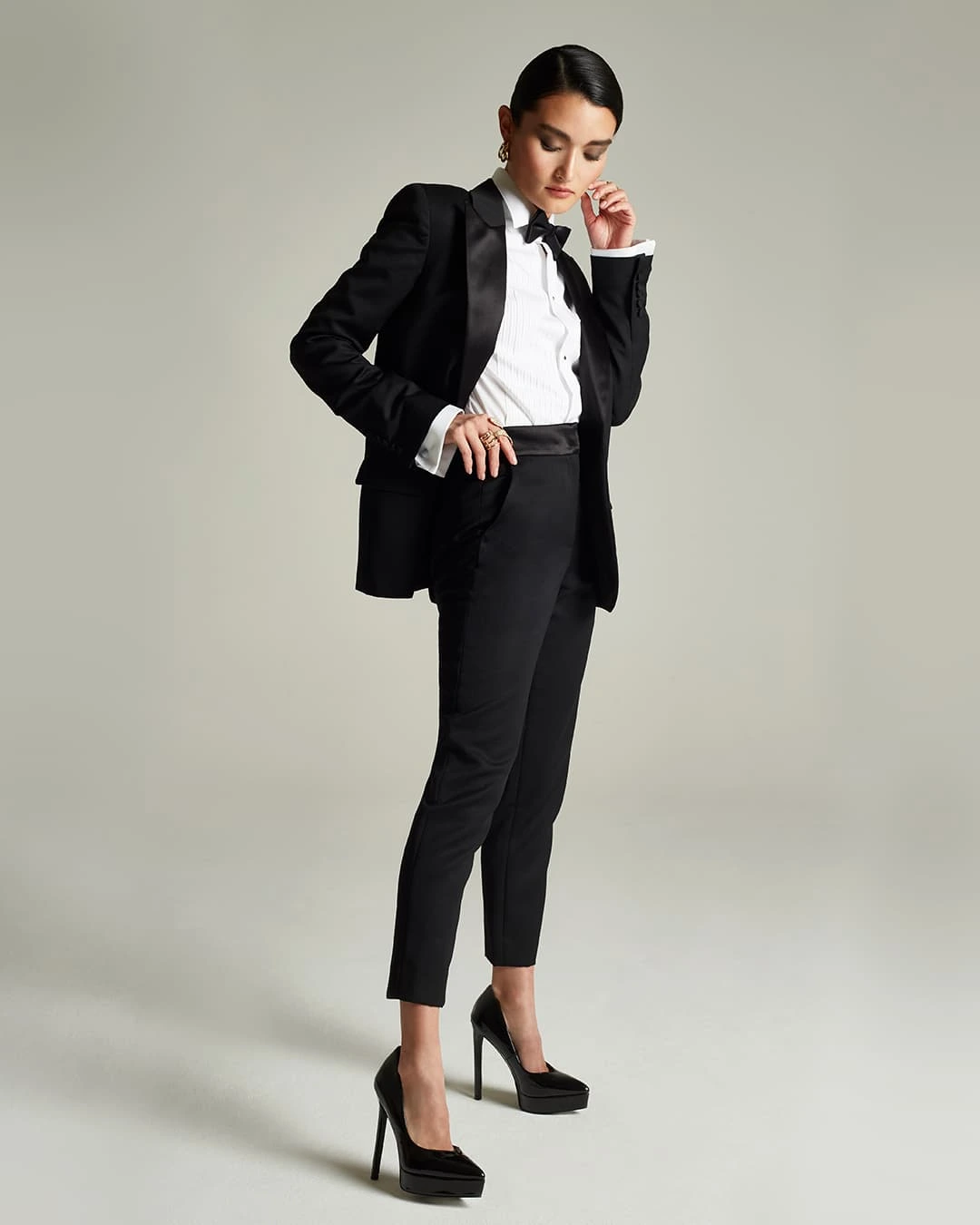 Black Tuxedo Suit with a Bow Tie and Platform Heels