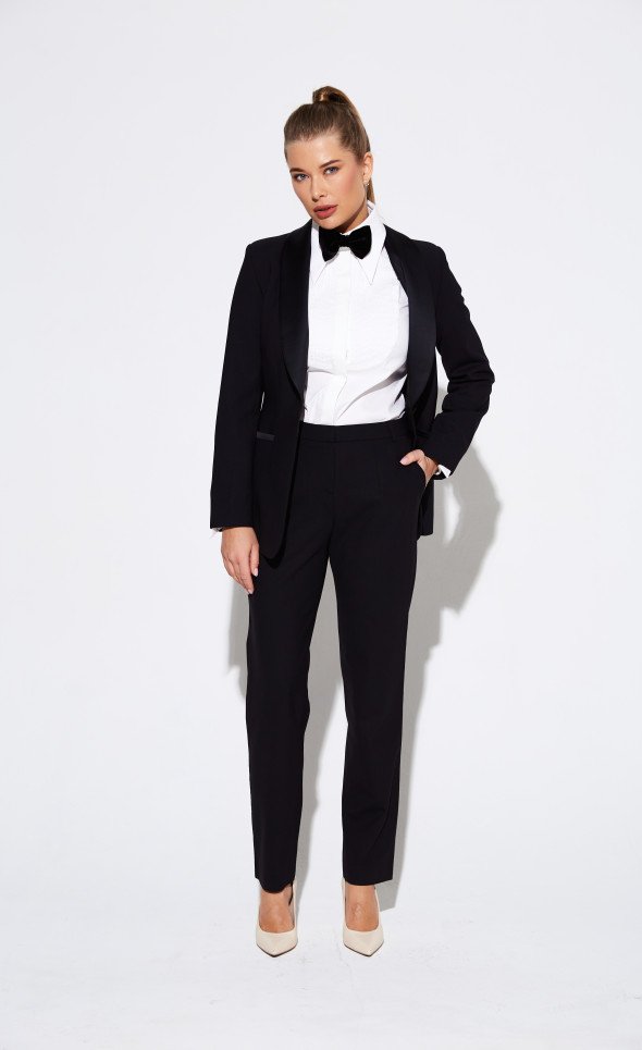 Black Tuxedo Suit with a Bow Tie and White Heels