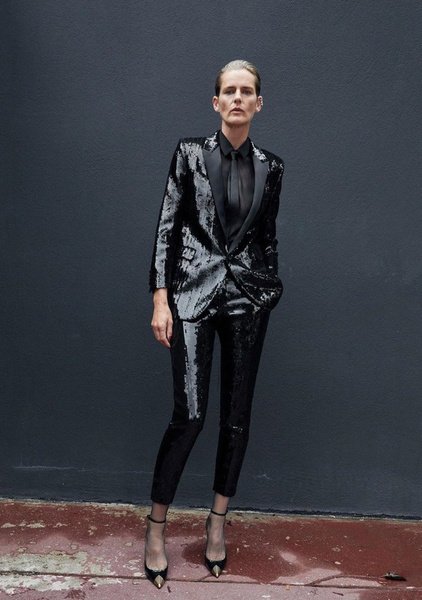 Black Sequin Tuxedo Suit with a Black Shirt and Tie
