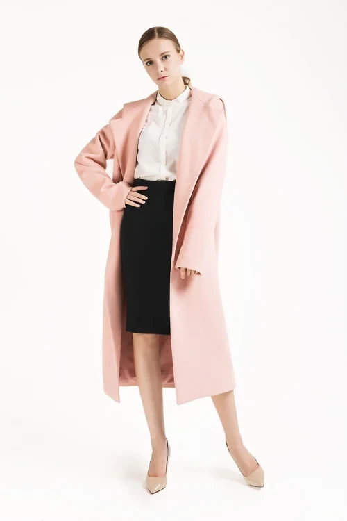 Blush pink coat and skirt outfit with elegant pointed flats and a cashmere wrap