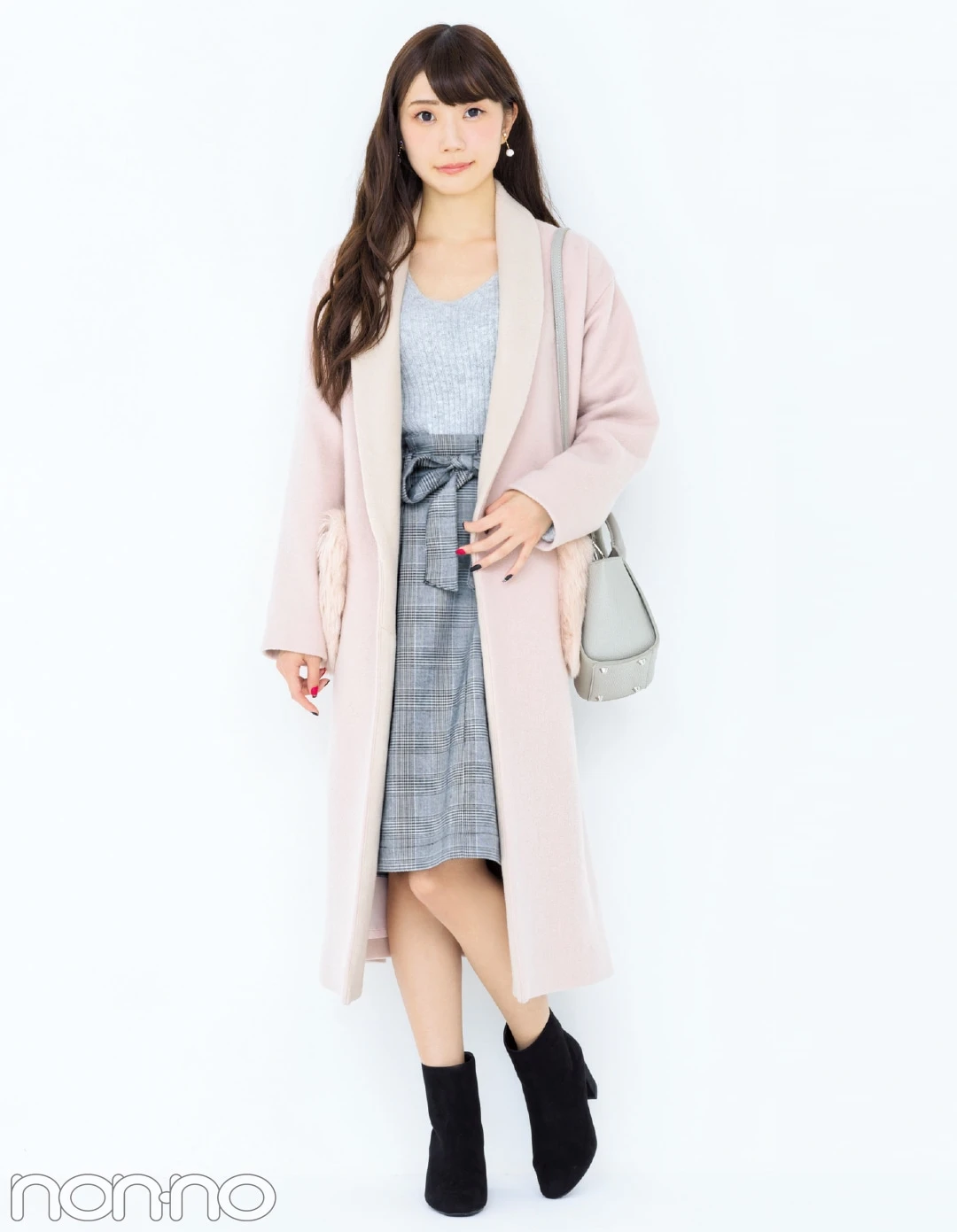 Soft pink coat and skirt outfit with suede ankle boots and silver drop earrings