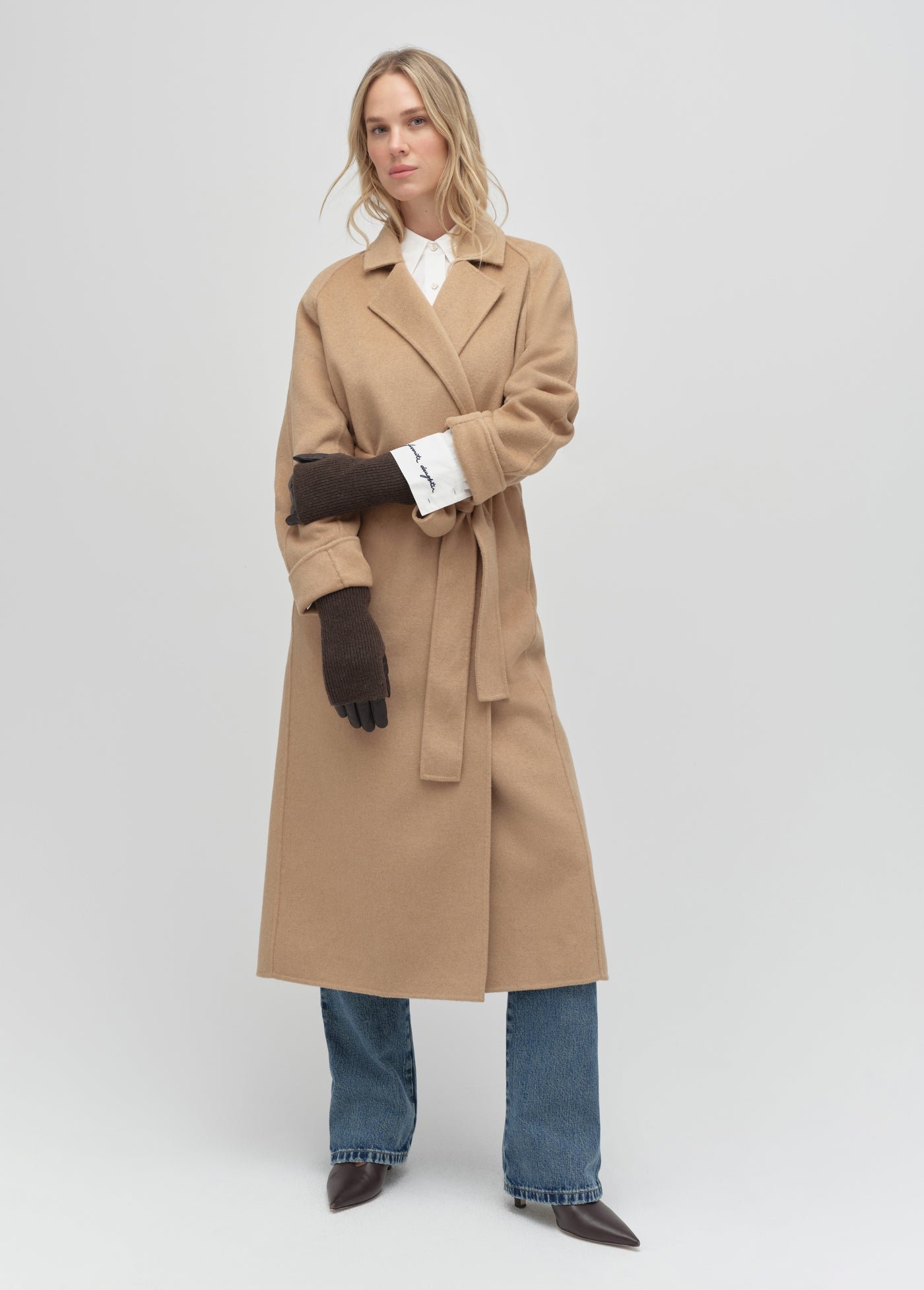 Camel Wool Coat, Brown Leather Gloves and Blue Jeans
