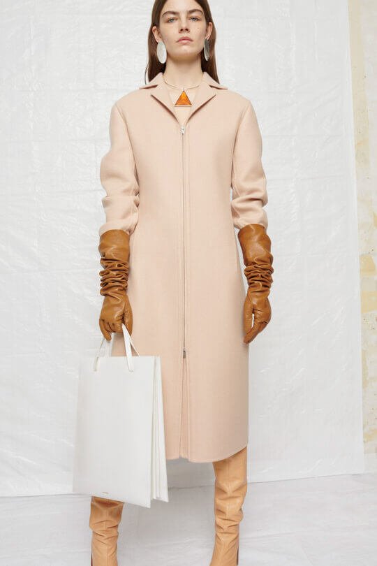 Pale Pink Coat, Tan Leather Gloves and Light Trousers