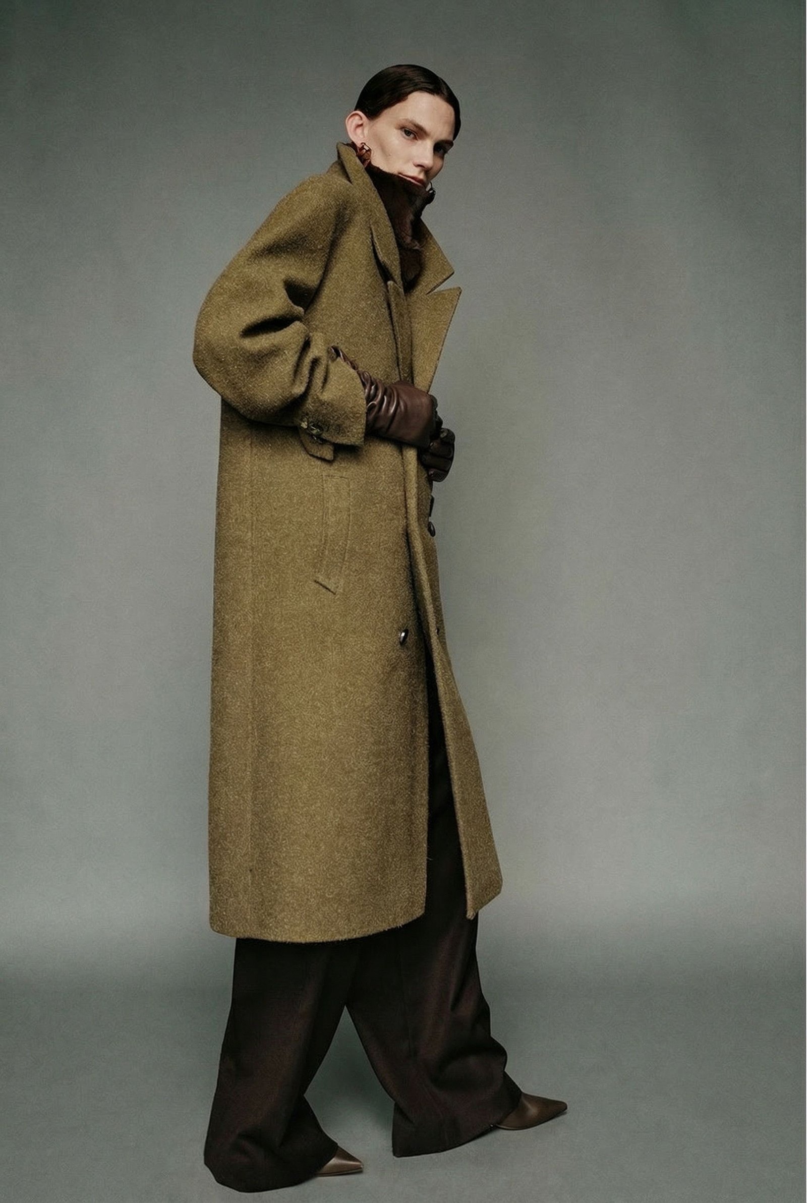 Olive Coat, Brown Leather Gloves and Dark Trousers