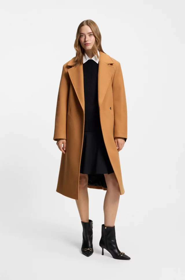 Camel Wool Coat Over a Black Sheath Dress