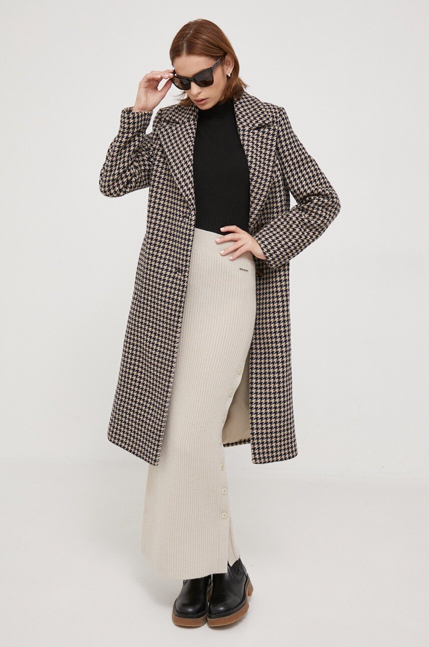 Checked Wool Coat Over a Midi Skirt and Knee Boots
