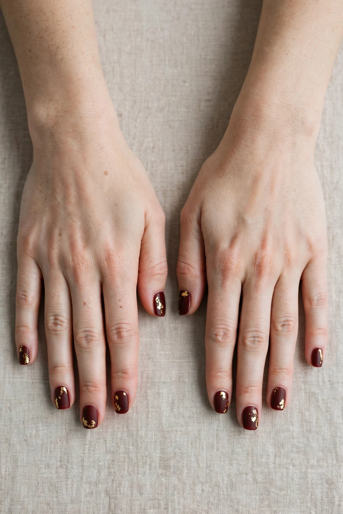 38 Cherry Cola Short Square Nails For January Office Wear That Are Chic, Warm and Elegant 3 Cherry Cola Short Square Nails with a soft matte finish and gold foil accents