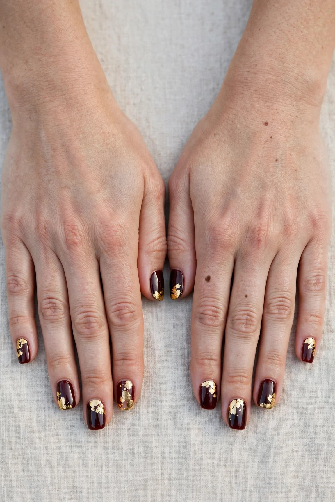 38 Cherry Cola Short Square Nails For January Office Wear That Are Chic, Warm and Elegant 13 Cherry Cola Short Square Nails with a deep glossy shine and gold foil accents