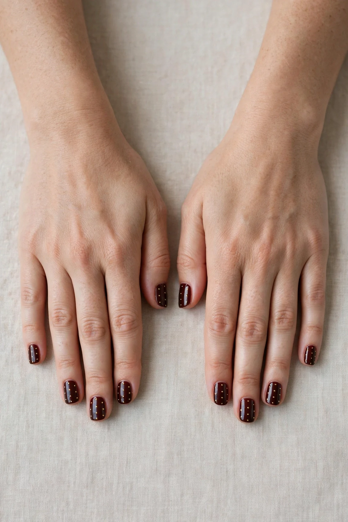 38 Cherry Cola Short Square Nails For January Office Wear That Are Chic, Warm and Elegant 14 Cherry Cola Short Square Nails with a high-gloss finish and tiny gold dots