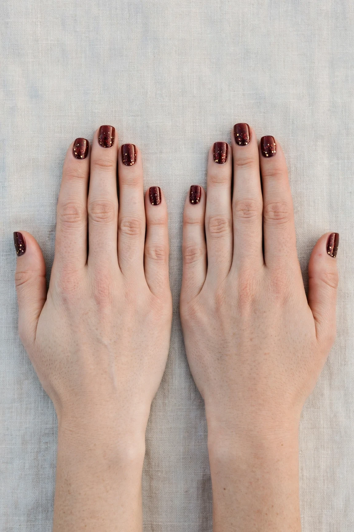 38 Cherry Cola Short Square Nails For January Office Wear That Are Chic, Warm and Elegant 20 Cherry Cola Short Square Nails with a glitter gradient finish and tiny gold dots