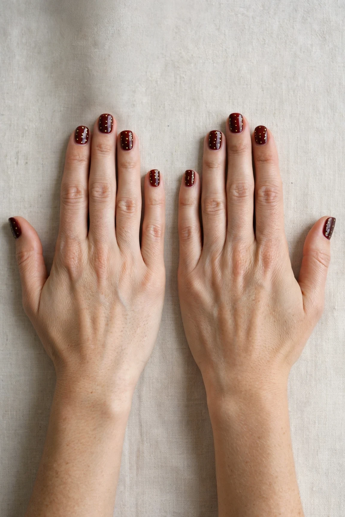 38 Cherry Cola Short Square Nails For January Office Wear That Are Chic, Warm and Elegant 24 Cherry Cola Short Square Nails with a creamy opaque finish and tiny gold dots