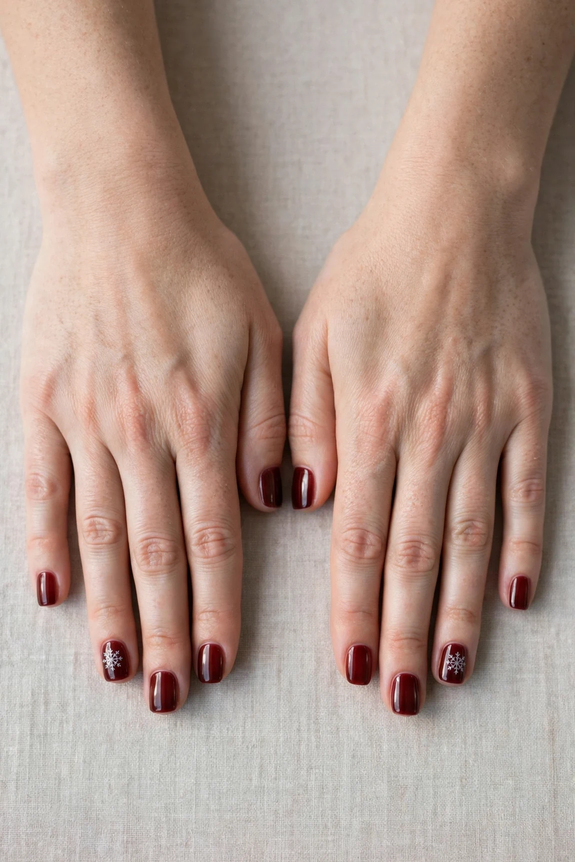 38 Cherry Cola Short Square Nails For January Office Wear That Are Chic, Warm and Elegant 30 Cherry Cola Short Square Nails with a sheer jelly finish and a delicate snowflake on the ring finger