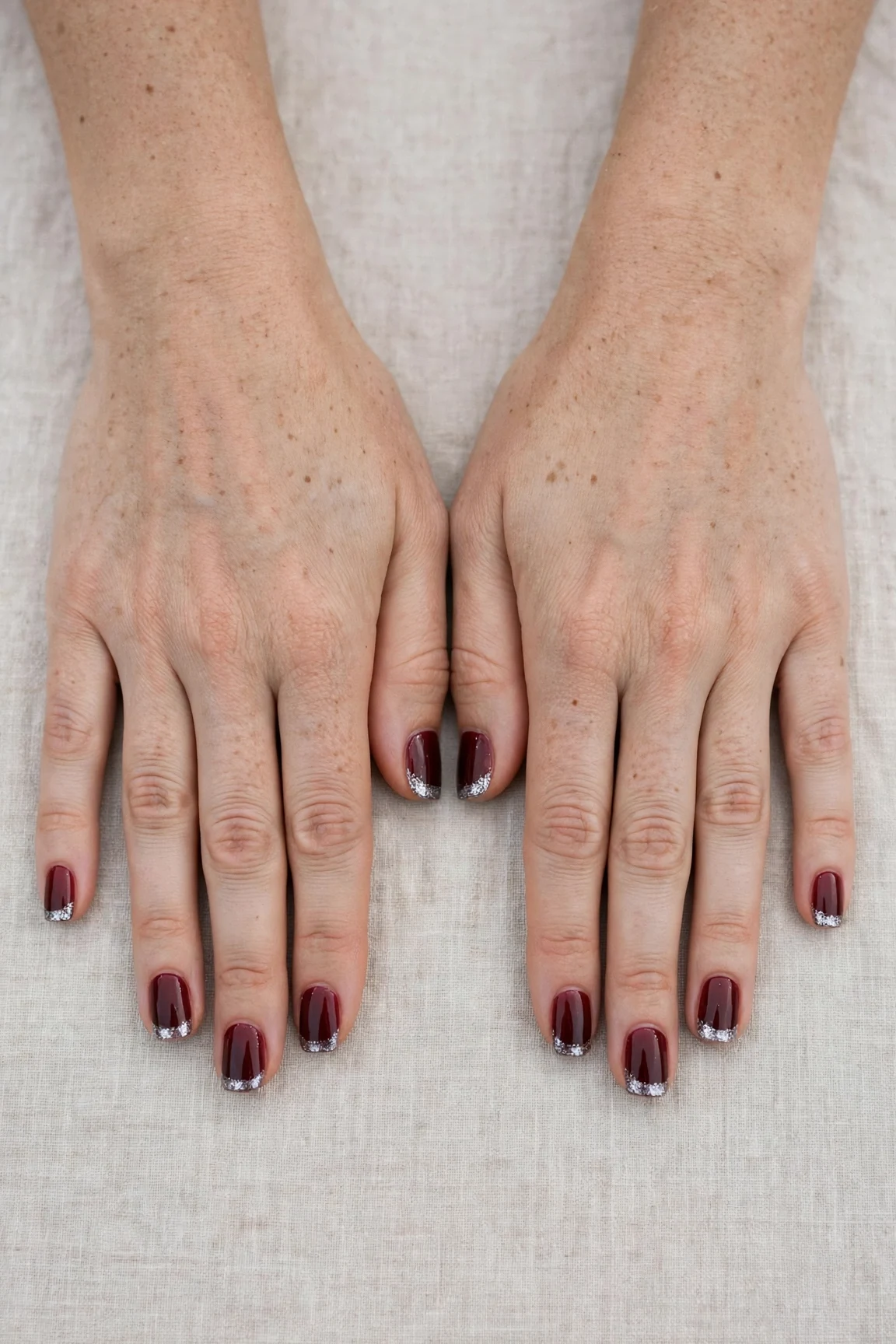 38 Cherry Cola Short Square Nails For January Office Wear That Are Chic, Warm and Elegant 38 Cherry Cola Short Square Nails with a high-gloss finish and silver shimmer tips