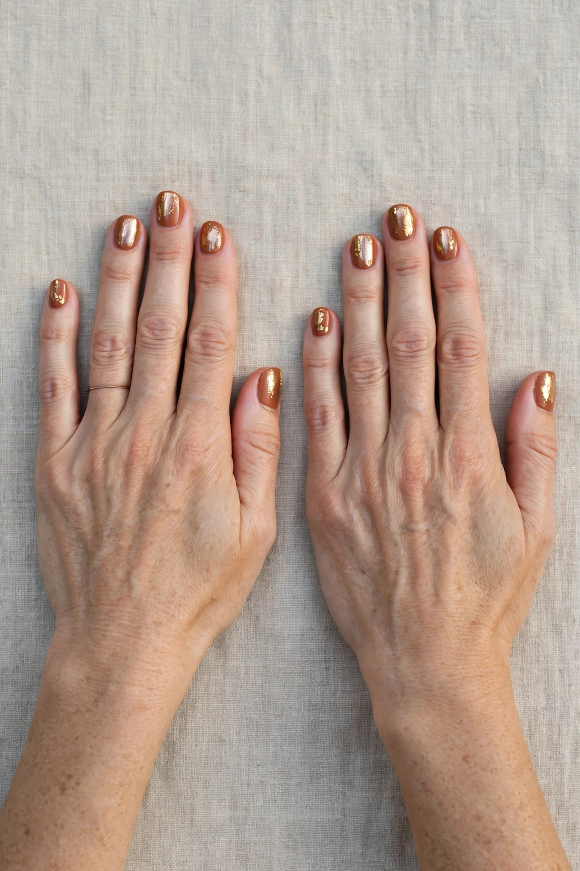 22 Cinnamon Spice Matte Nails For Women Over 40 For January Parties That Are Chic, Warm and Elegant 5 Short Square Cinnamon Spice Matte Nails with a chrome shine and gold foil accents