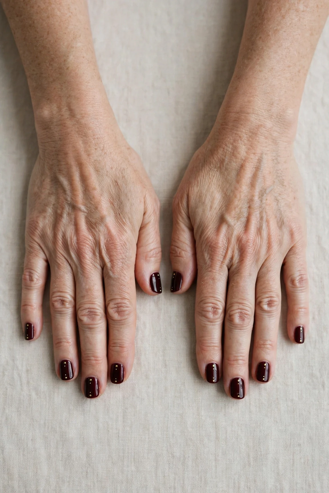 Short Square Dark Cherry Velvet Manicure Ideas with a glassy gel finish and tiny gold dots