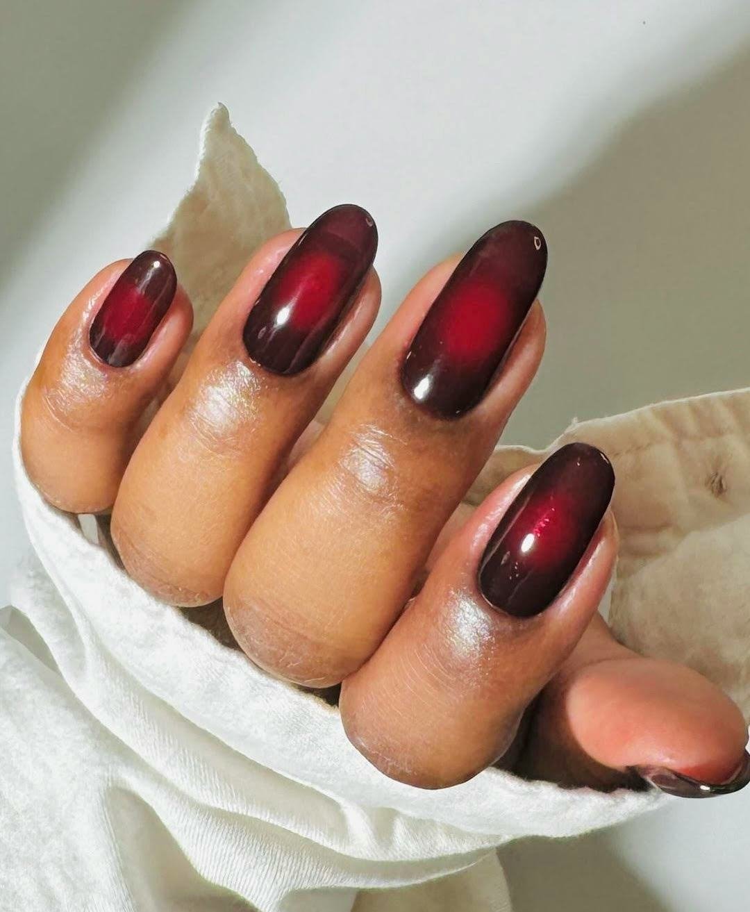 50 Dark Jelly Gradient Nails for Winter Evening Events That Are Deep, Glossy and Made for the Night 24 Dark Red Jelly Gradient Oval Nails for Winter Evening Events