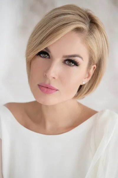Deep Side Part Short Hair with a Polished Tuck for a Classic Finish