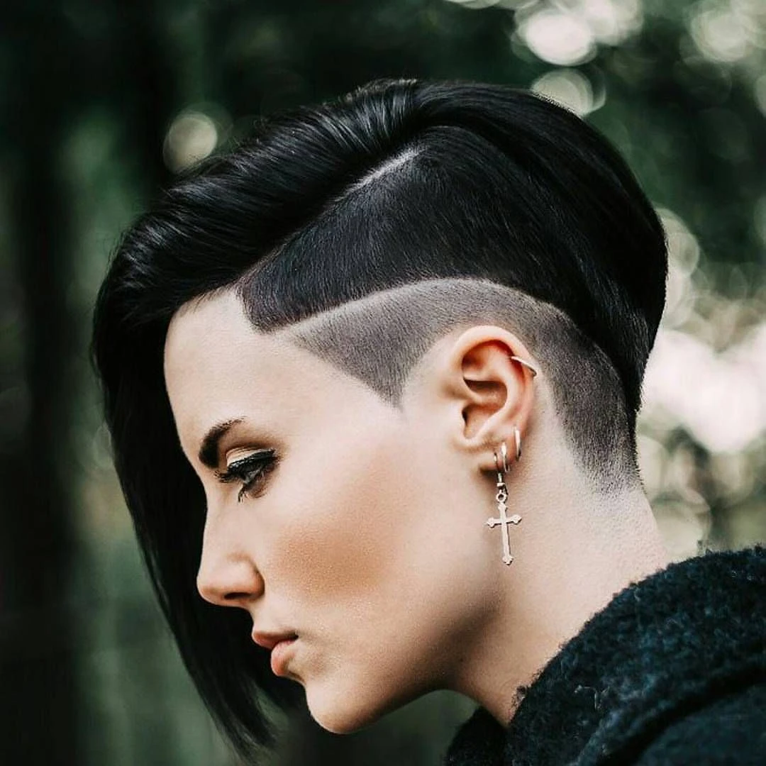 Short Bob with a Deep Side Part and a Polished Tuck for Cold Evenings