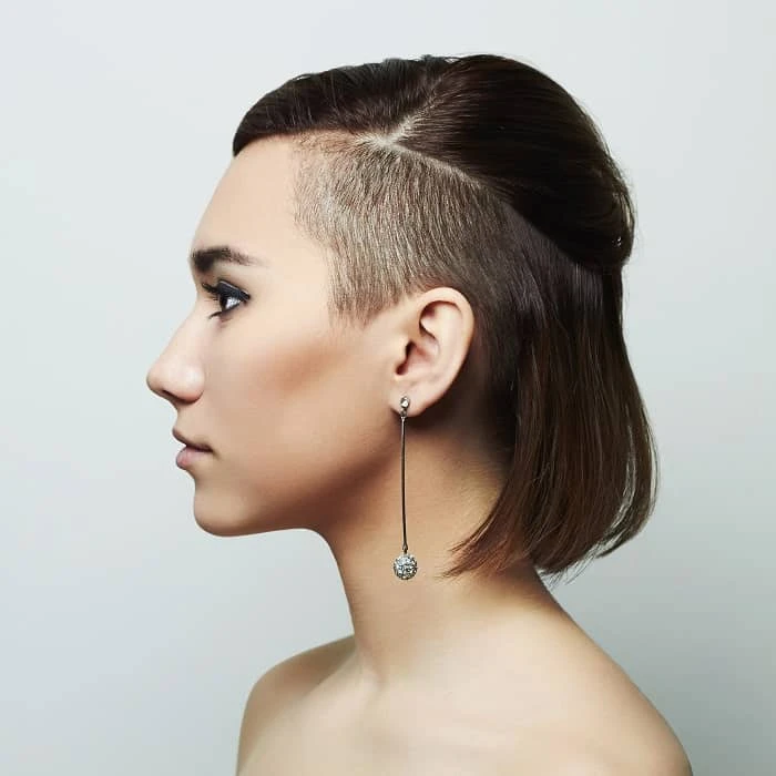Polished Short Hair with a Deep Side Part and Smooth Tuck with a Soft Tuck