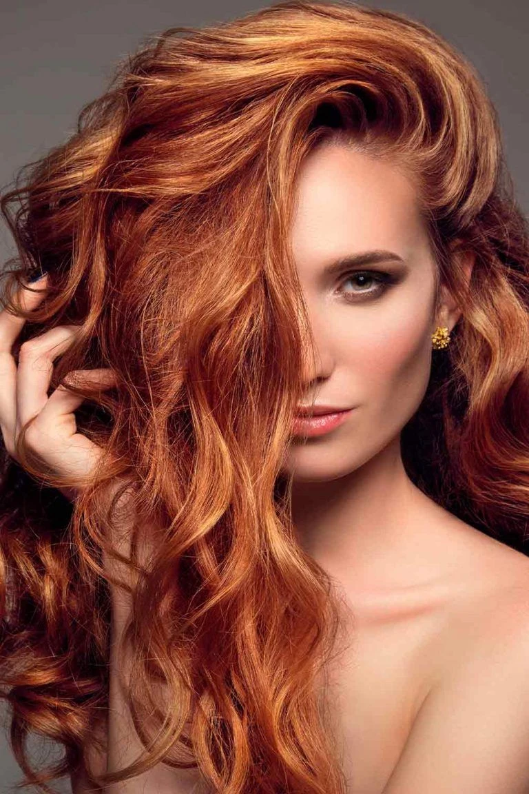 Wavy Hair with a Deep Side Part and Lifted Crown