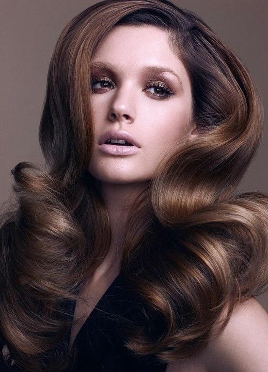 Deep Side Part Wavy Hair with a Rounded, Full Shape