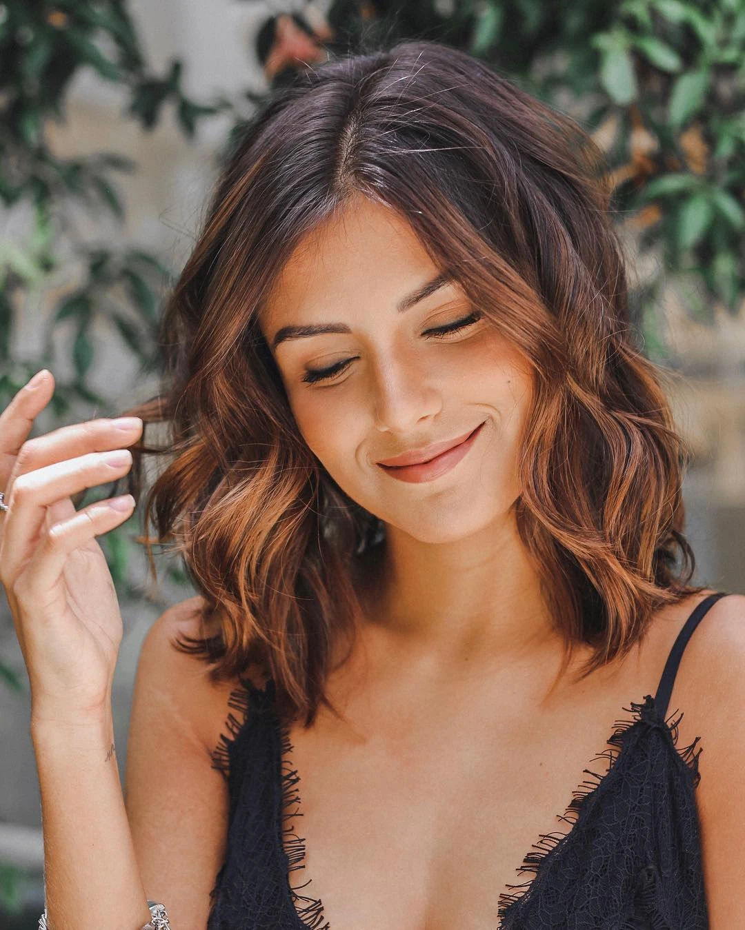 Voluminous Wavy Hair with a Deep Side Part and Soft Ends