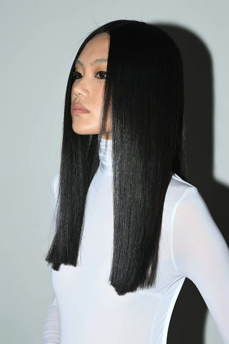 Deep Side Part with Pin-Straight Winter Lengths with a Glossy Finish