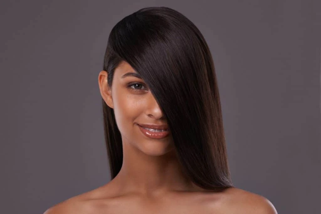 Deep Side Part Sleek Lengths with a Glossy Finish for Cold Days