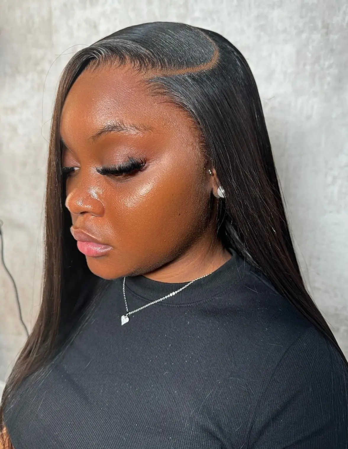 Sleek Straight Hair with a Deep Side Sweep for Winter Days