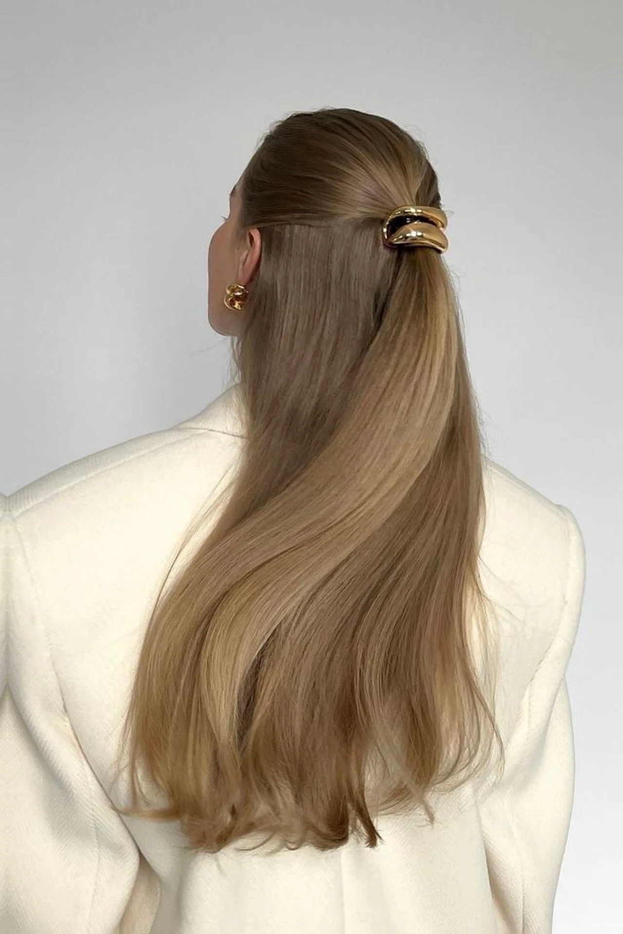 Classic Lob-Length Slick Ponytail with Gold Clips