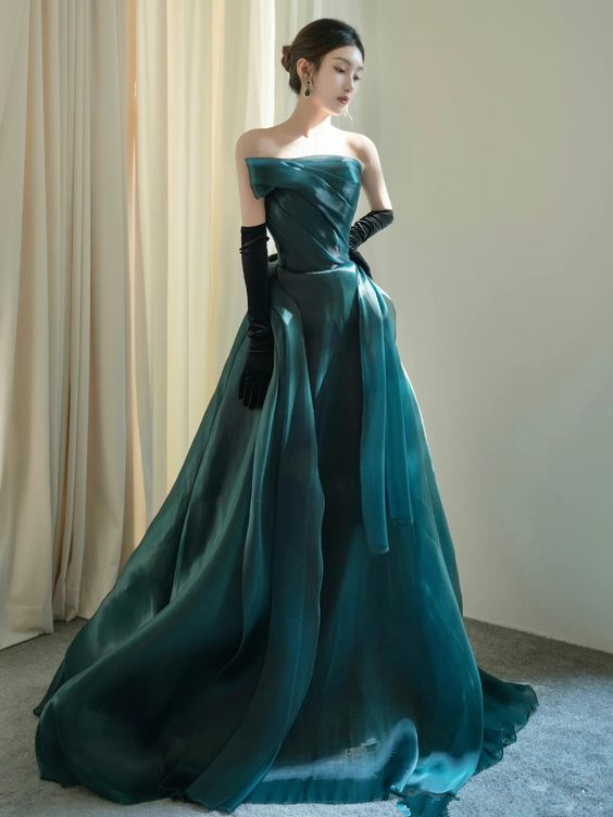 Teal Satin Gown and Black Leather Gloves