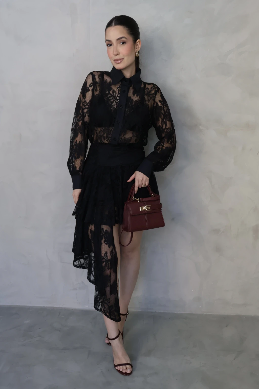Black Lace Top and Midi Skirt with a burgundy clutch