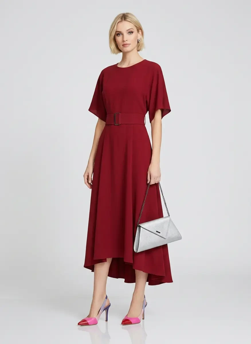 Ruby Midi Dress with a small black clutch