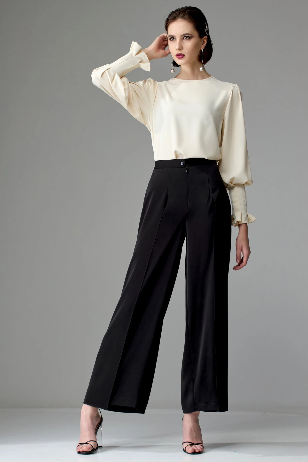 Cream Ruffle Blouse and Trousers with a soft black shawl