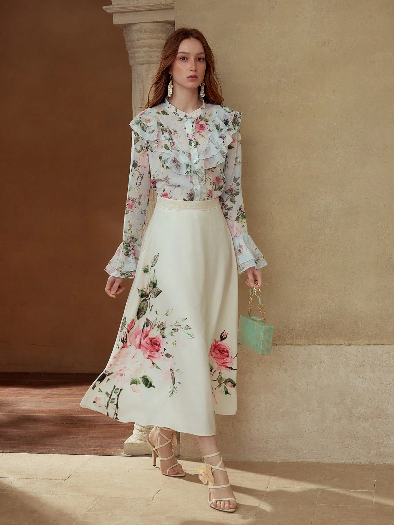 Floral Ruffle Blouse and Midi Skirt with a small black clutch