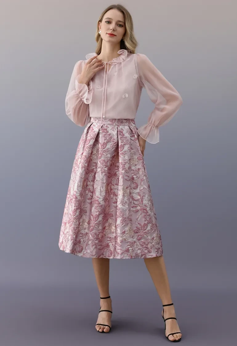 Pink Ruffle Sleeve Blouse and Skirt with a small black clutch